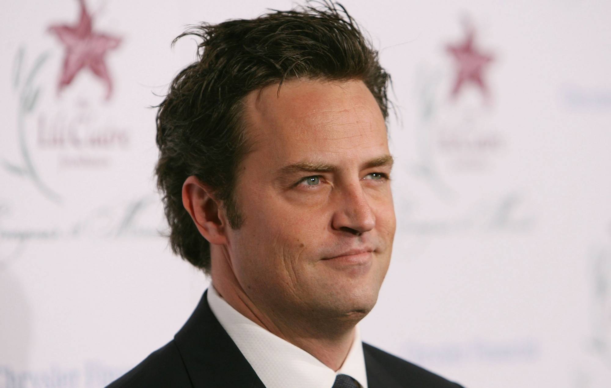 Fans pay tribute to Matthew Perry by laying flowers outside ‘Friends’ apartment building