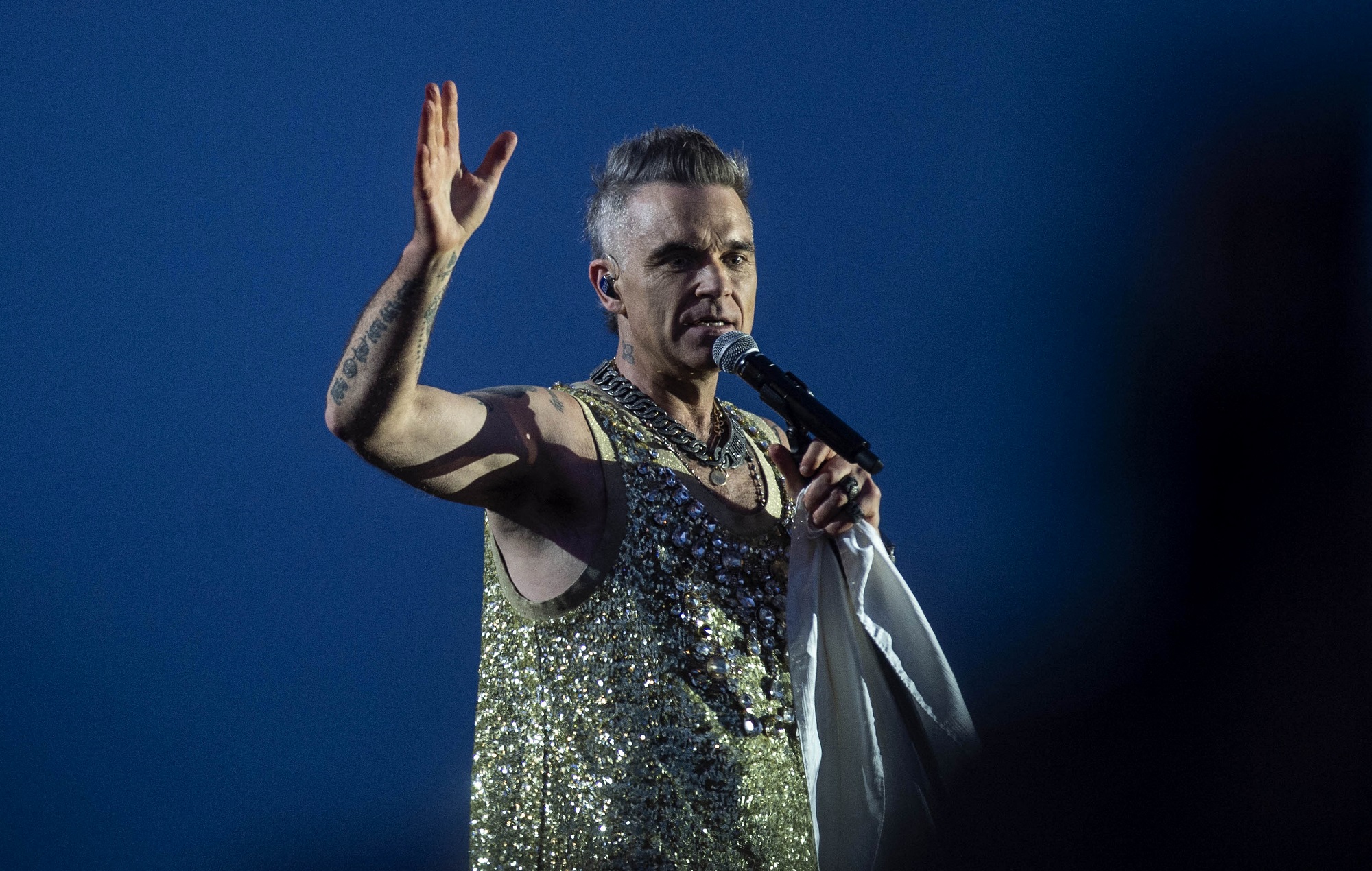 Robbie Williams pays tribute and dedicates ‘Angels’ to fan who died after Sydney concert