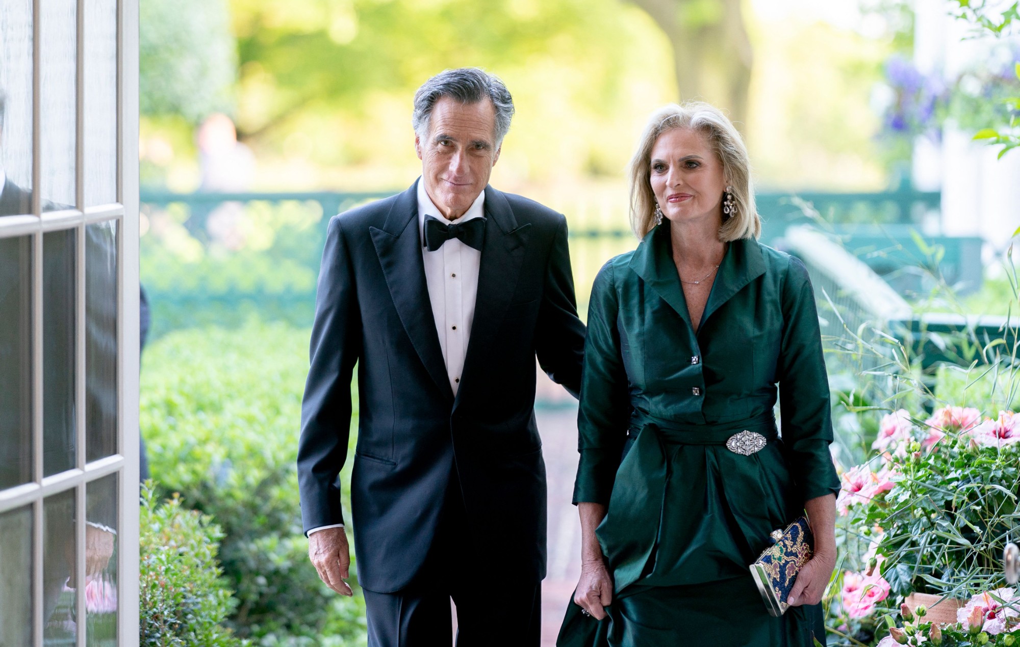 Mitt Romney and his wife dress up as Travis Kelce and Taylor Swift for Halloween