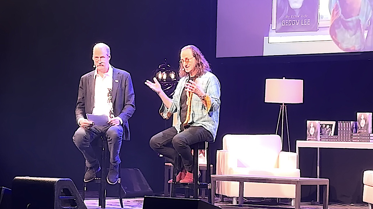 “Circus magazine said, ‘If Lee’s voice was any higher and raspier, his audience would consist exclusively of dogs and extraterrestrials”: Watch Geddy Lee read from his memoir My Effin’ Life onstage in Seattle with Nirvana’s Krist Novoselic