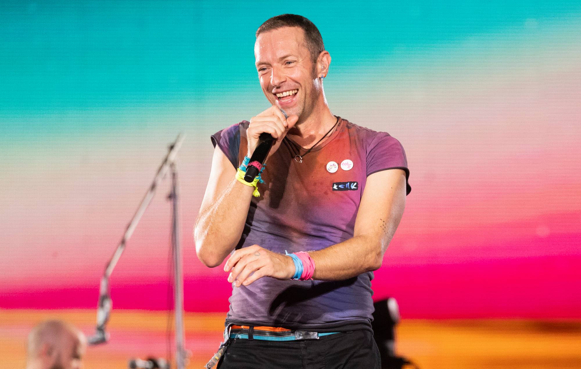 Coldplay are offering free tickets to fans affected by flight cancellations in Australia