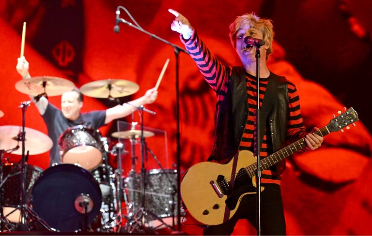 Watch Green Day play ‘Good Riddance…’ with a fan at intimate Paris gig