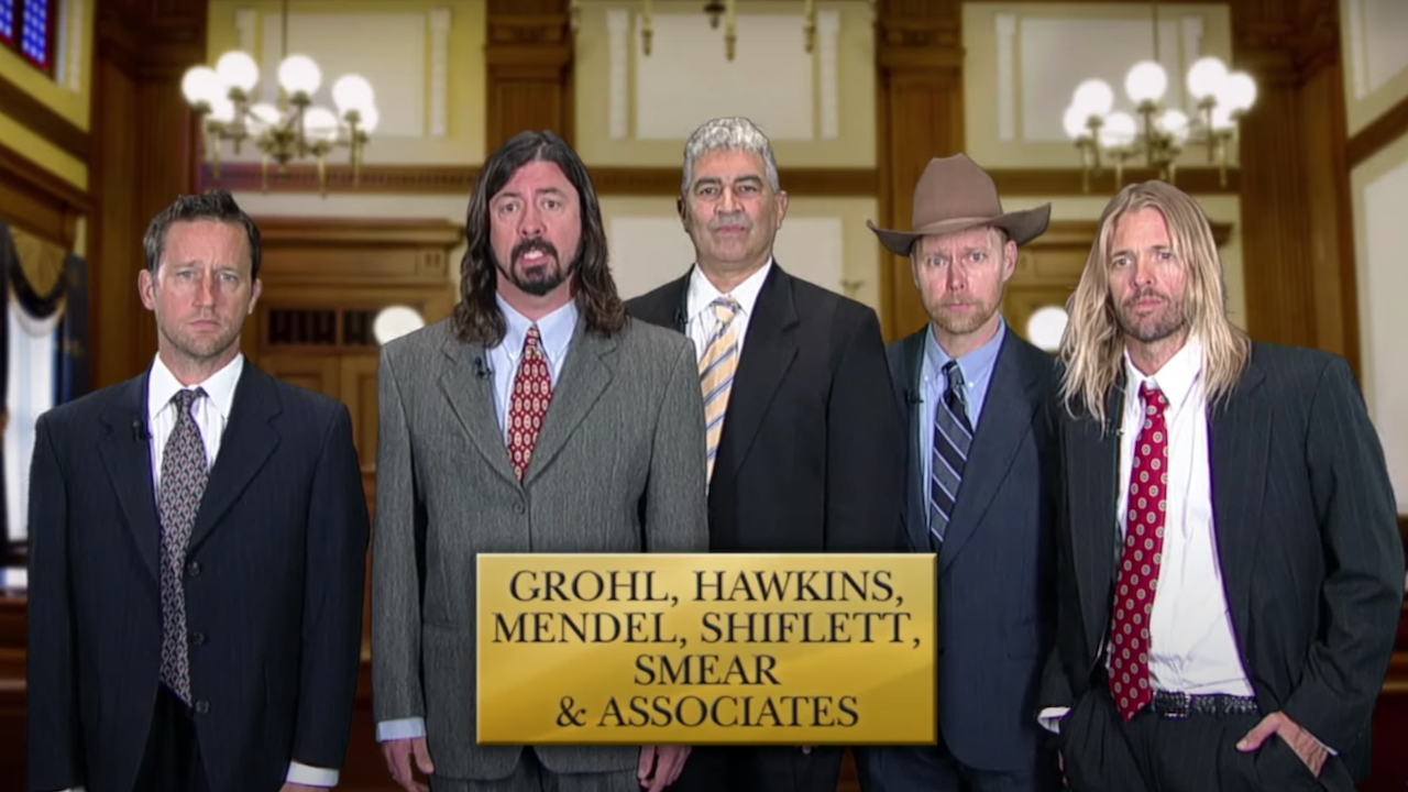 “We’ll fight Foo day and night to make sure you receive the compensation you deserve.” Watch the brilliant moment Foo Fighters posed as lawyers in a fake TV commercial