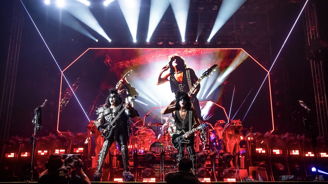 Gene Simmons says that he’s “totally open” to the idea of a future version of Kiss existing without any members of Kiss: “Why not pass the baton, pass the crown to four new, young people who are deserving?”