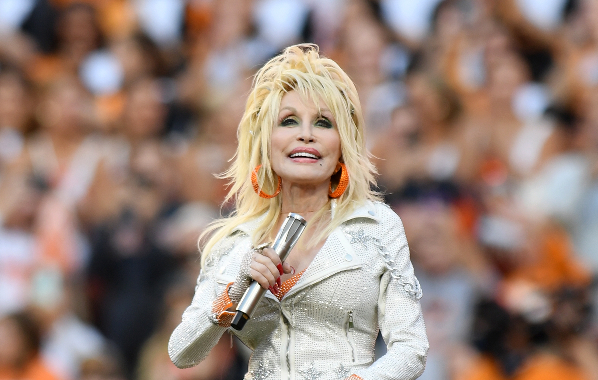 Dolly Parton on why she wrote protest song ‘World On Fire’: “This world is going up in flames”