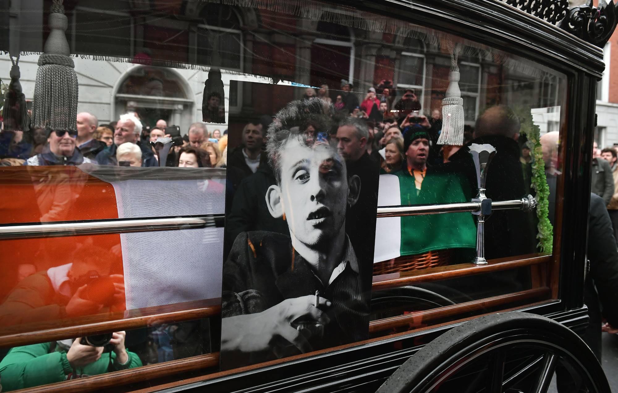 Fans line the streets of Dublin for Shane MacGowan’s funeral