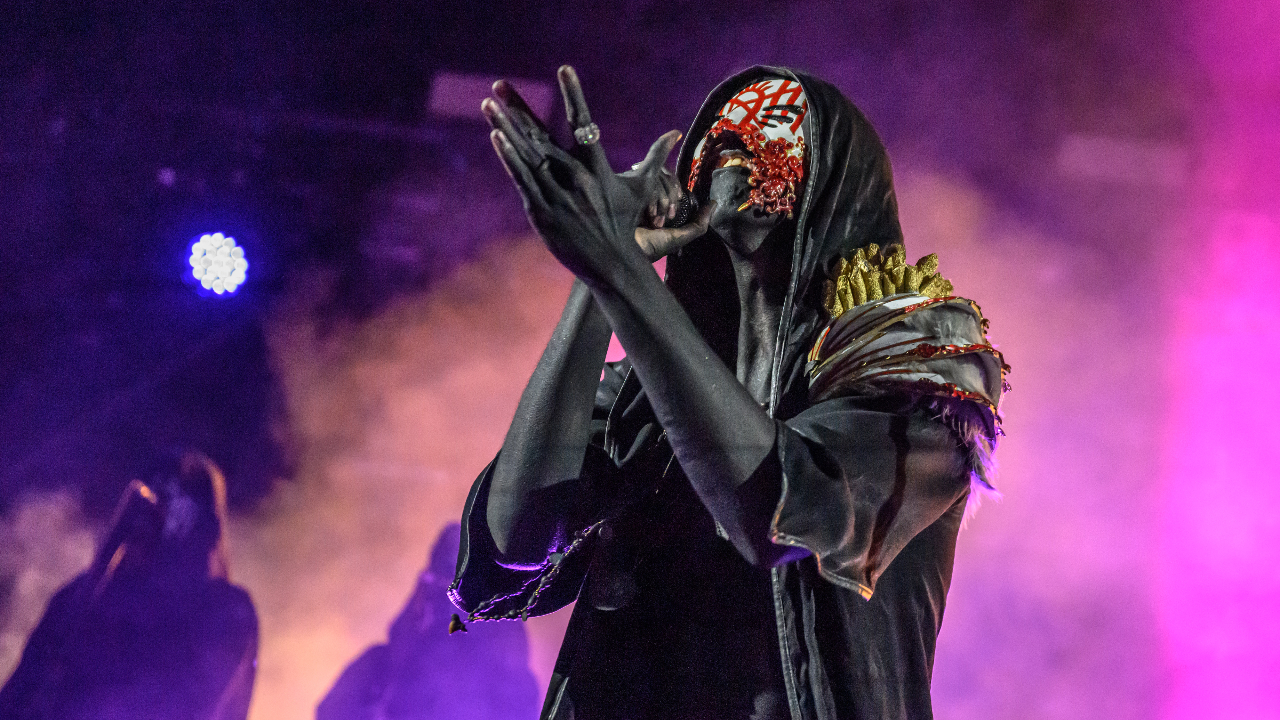 “He’s not well…you guys gotta be loud.” Watch Vessel take a step back from singing at last night’s historic Sleep Token show at Wembley Arena, as band reveal startling new, nu metal-style masks