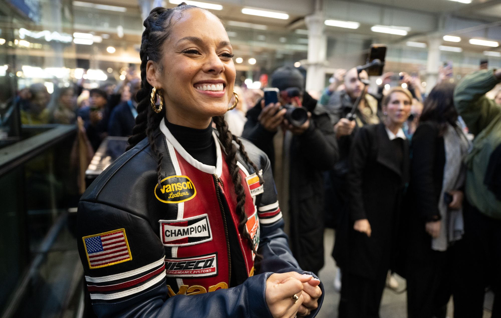 Watch Alicia Keys surprise fans with London train station performance