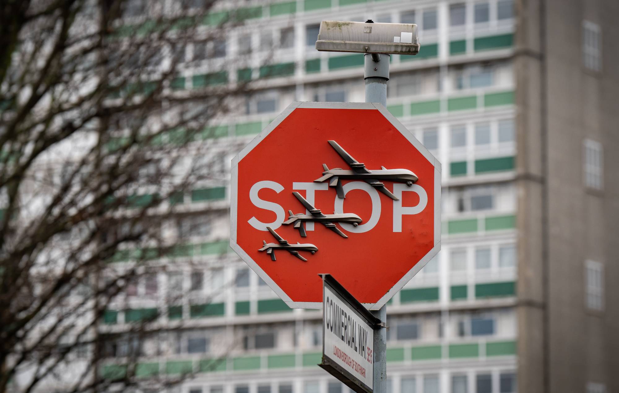 Man arrested on suspicion of stealing Banksy road sign artwork