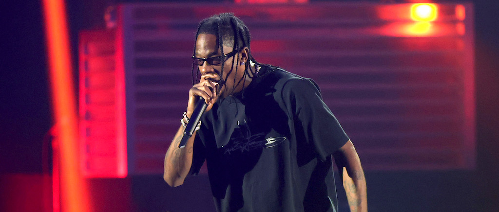 Travis Scott’s Own Giant Head Almost Knocked Him Off Stage During His Tour