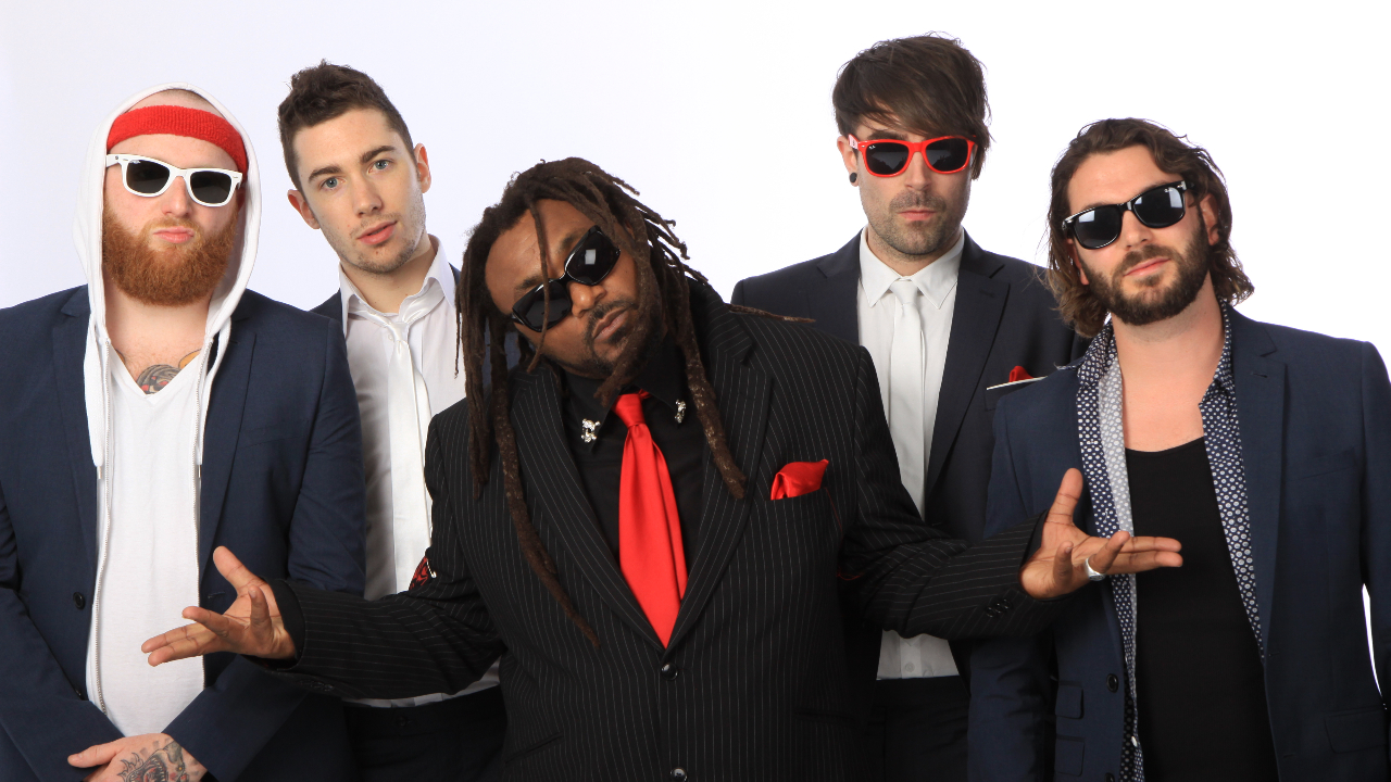 “I just wanted to kill everybody in the room!” How Warning revitalised Skindred’s career, gave us the iconic Newport Helicopter and confirmed them as British metal’s greatest party band