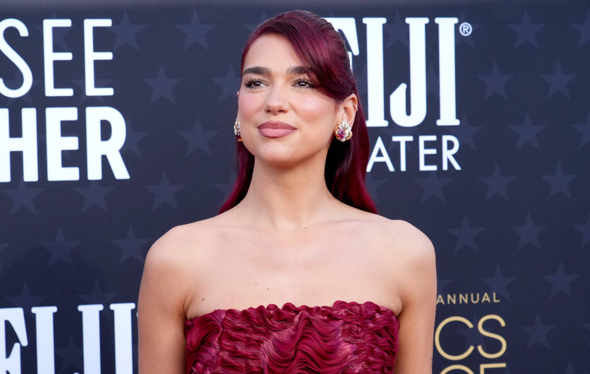 Dua Lipa thinks people don’t want pop stars to be “political” or “smart”