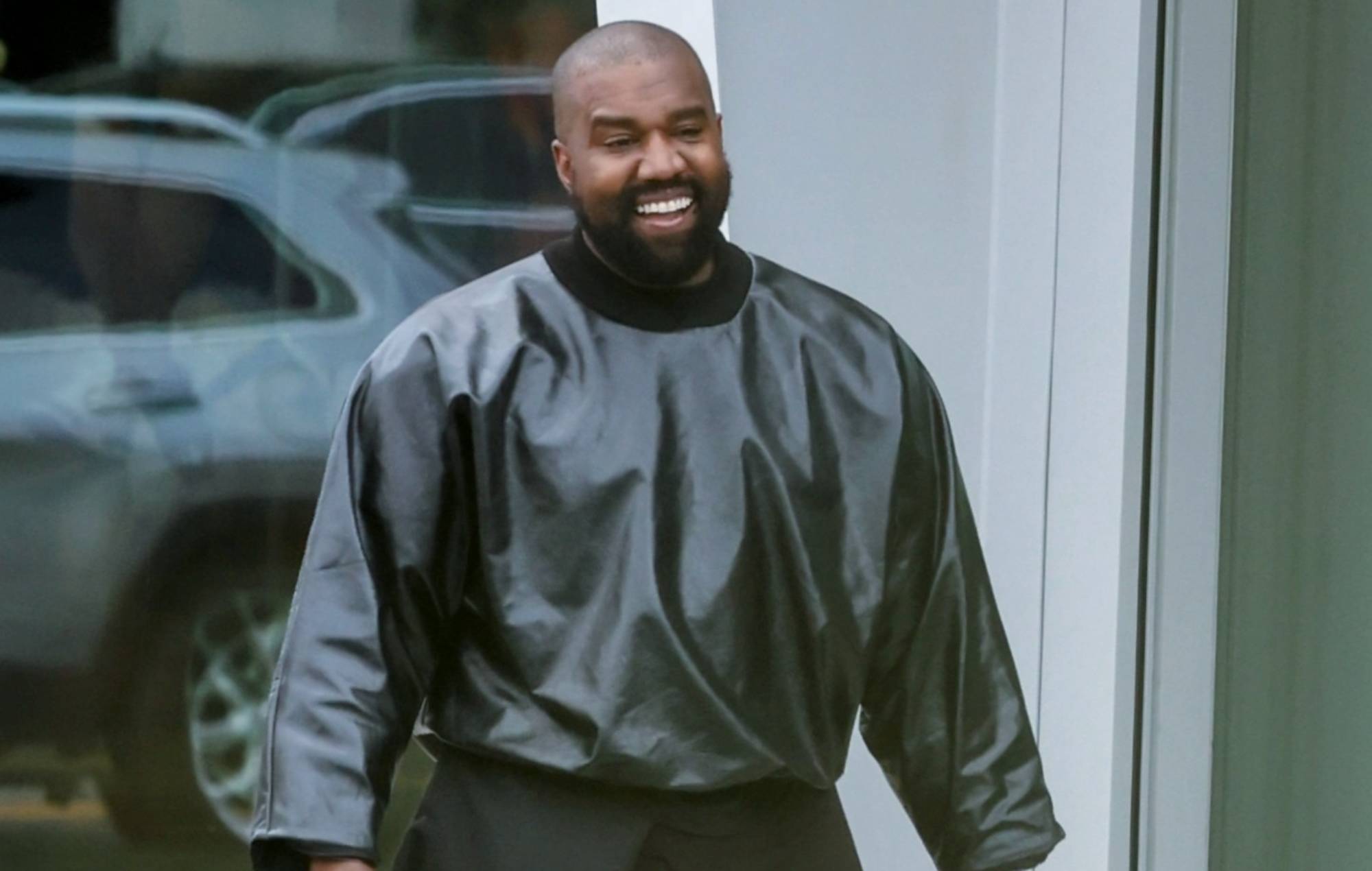 Kanye West seems to have replaced all his teeth with titanium dentures