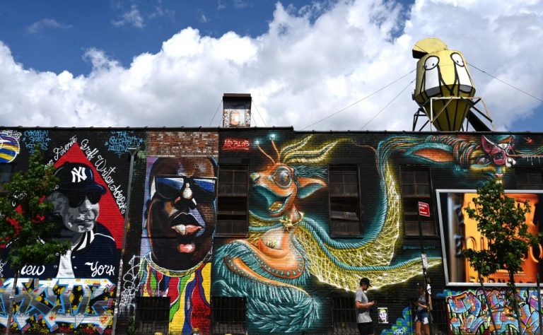 Biggie Mural Restored In Brooklyn After Being Painted Over By Cannabis Dispensary