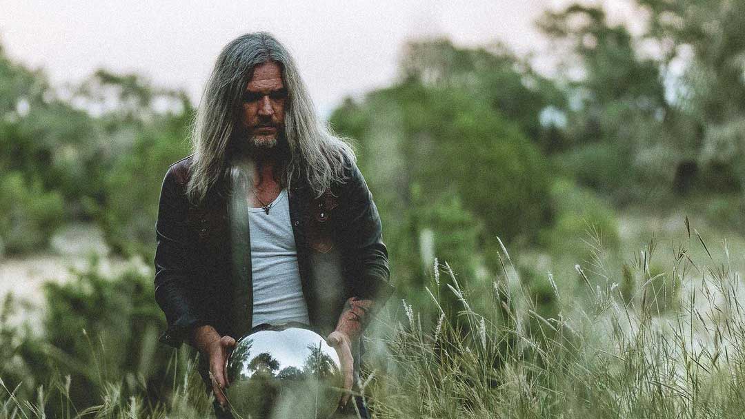 “He ended up moving to Hawaii and living in the jungle in a tent for two decades”: Israel Nash on the stories that inspired new album Ozarkers