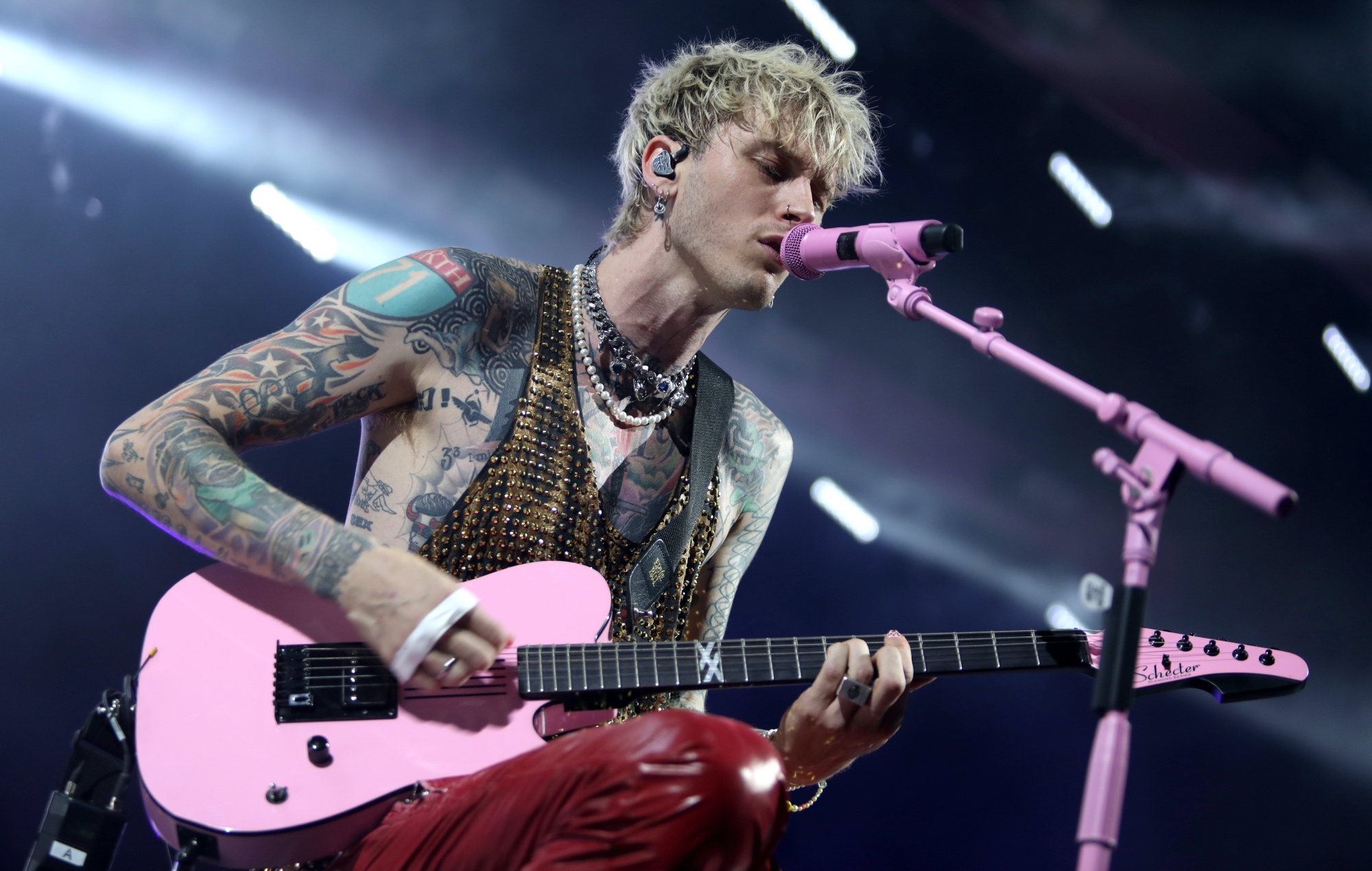 Machine Gun Kelly says bold new blackout tattoo was for “spiritual purposes”