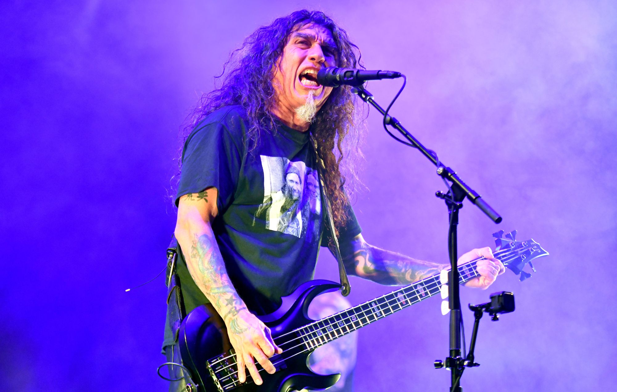 Tom Araya’s wife hits back at “trolls” over Slayer reunion, says she “harassed him for over a year” to make it happen