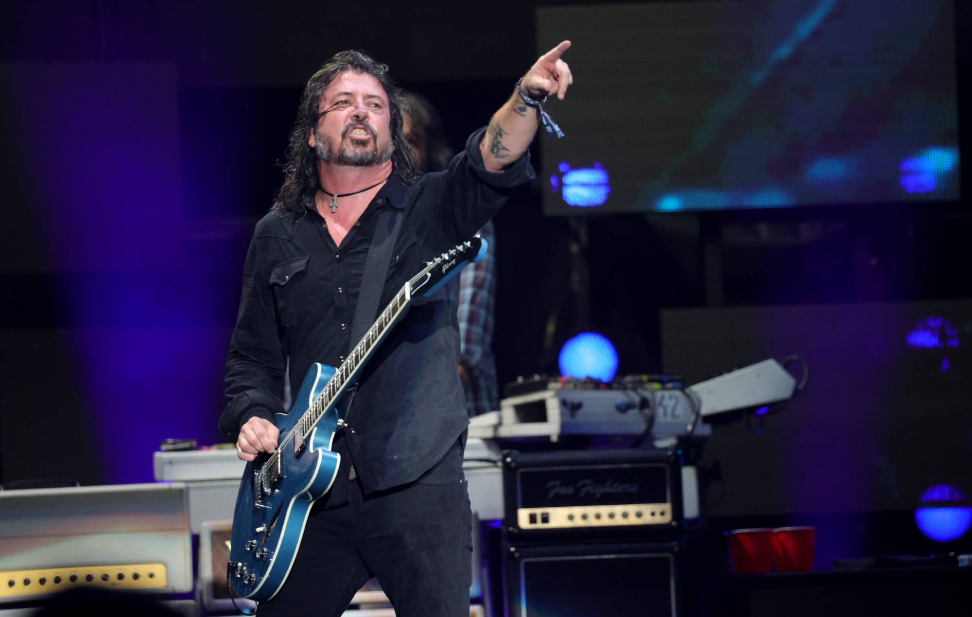 Dave Grohl spends Super Bowl barbecuing at homeless shelter