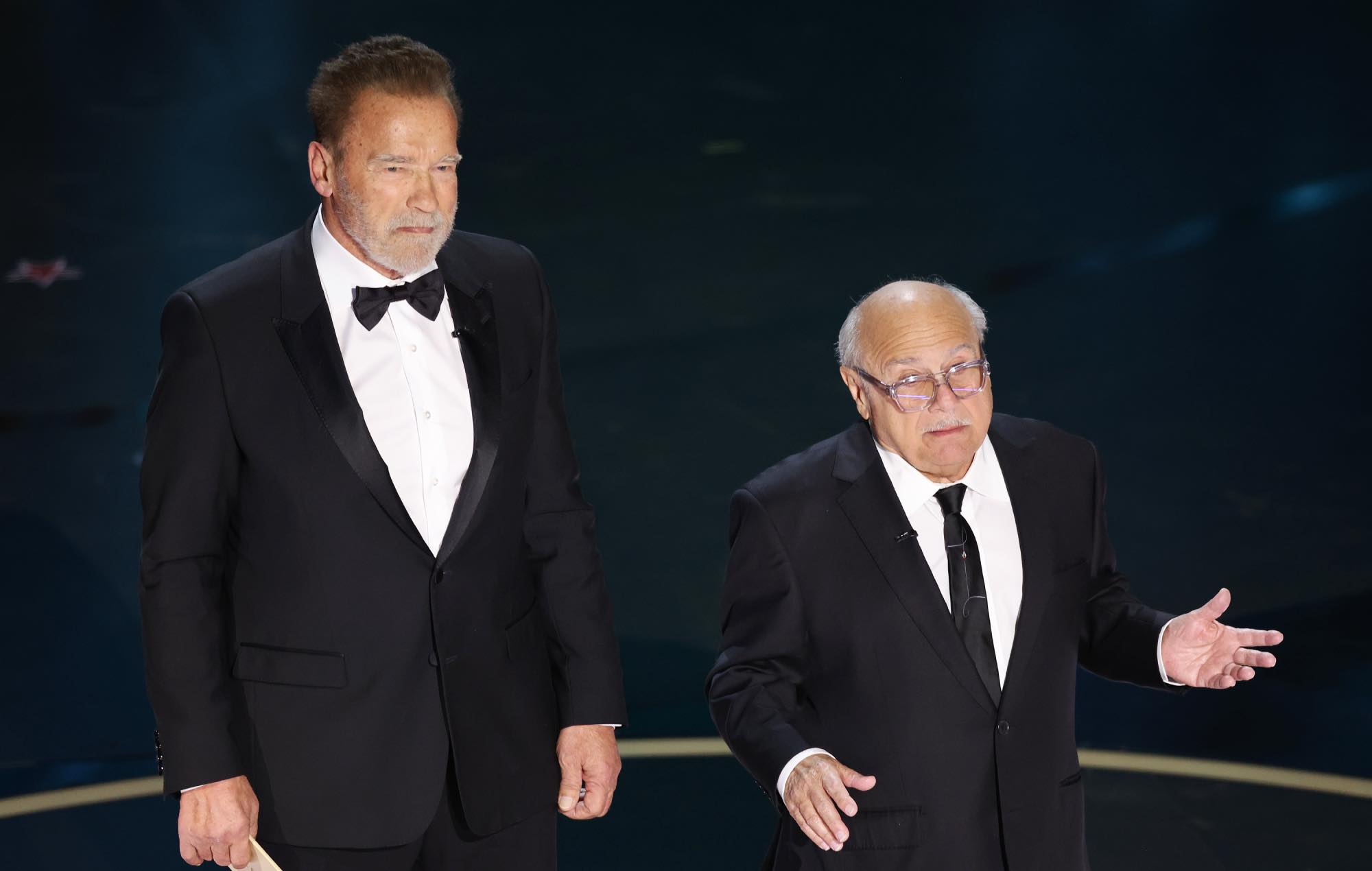 Danny DeVito and Arnold Schwarzenegger berate Michael Keaton about ‘Batman’ during Oscars reunion