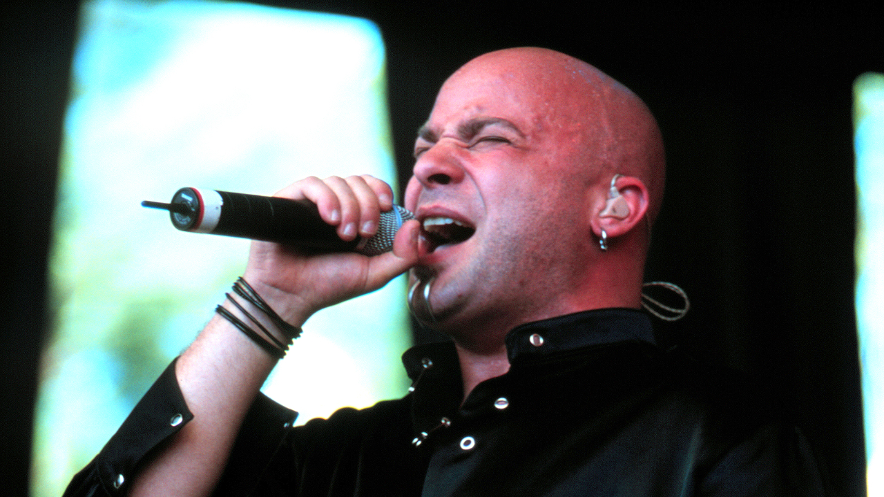 “The guys stopped the song. They all looked at me like, ‘What are you doing?'” How David Draiman came up with the legendary ‘OOH-AH-AH-AH-AH’ monkey noise on Disturbed’s nu metal classic, Down With The Sickness