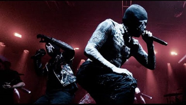 “I think he’d like to see a wall of death”: Watch side-stage footage of Sleep Token teaming up with a masked Oli Sykes during Bring Me The Horizon’s Brisbane show