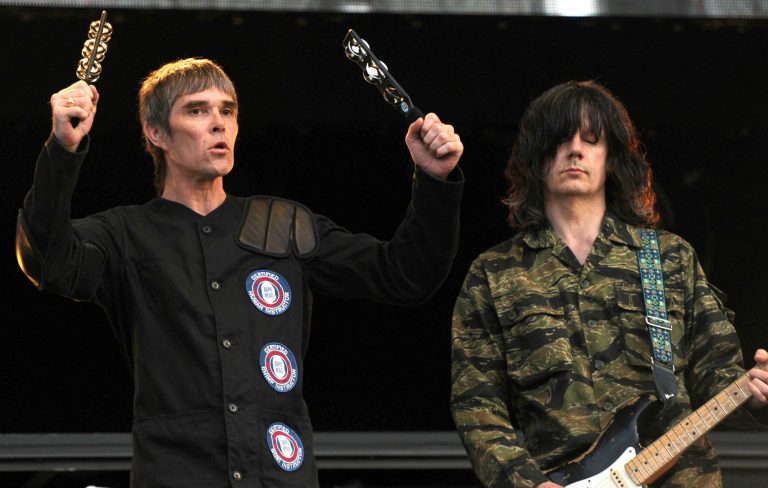 John Squire says The Stone Roses “aren’t sending each other Christmas cards or anything”