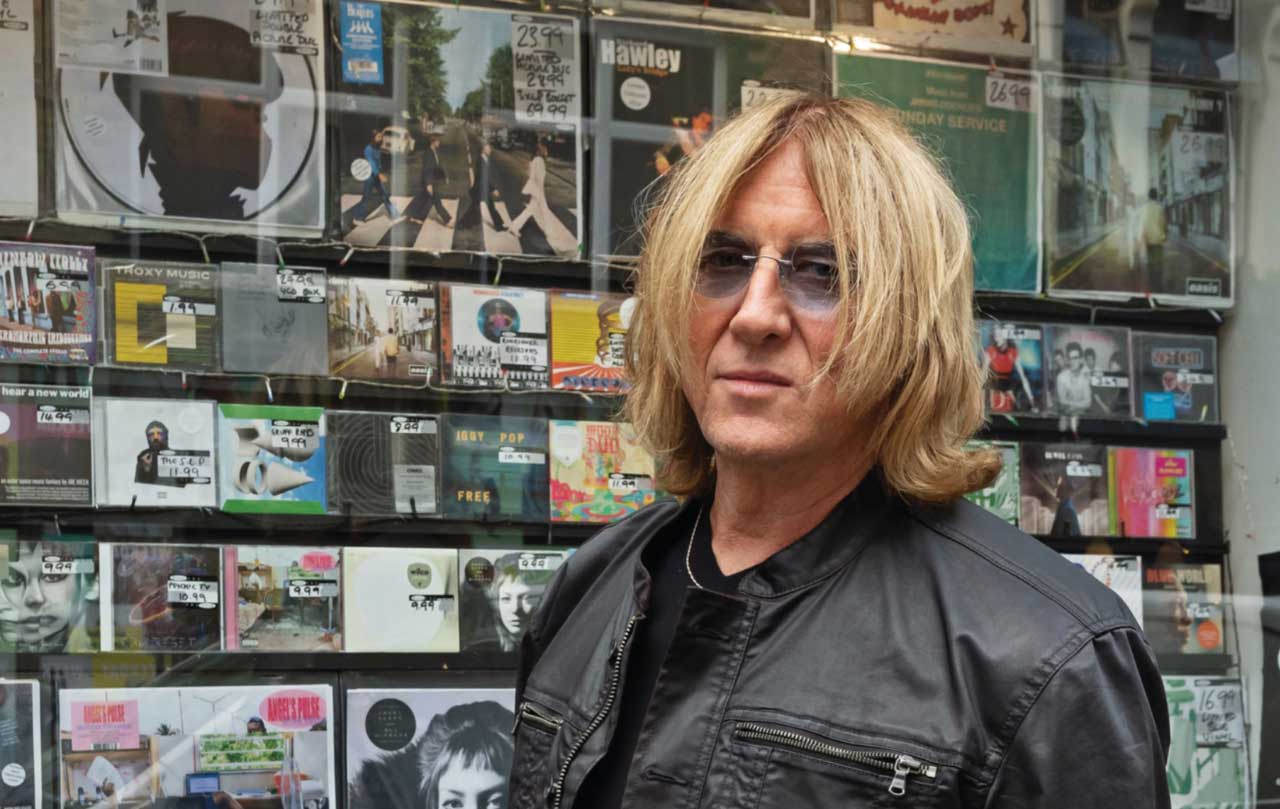 “Me, Bono and Bowie hijacked a Mini and drove to this restaurant where the Edge was to sing him Happy Birthday”: What happened when we went record shopping with Joe Elliott