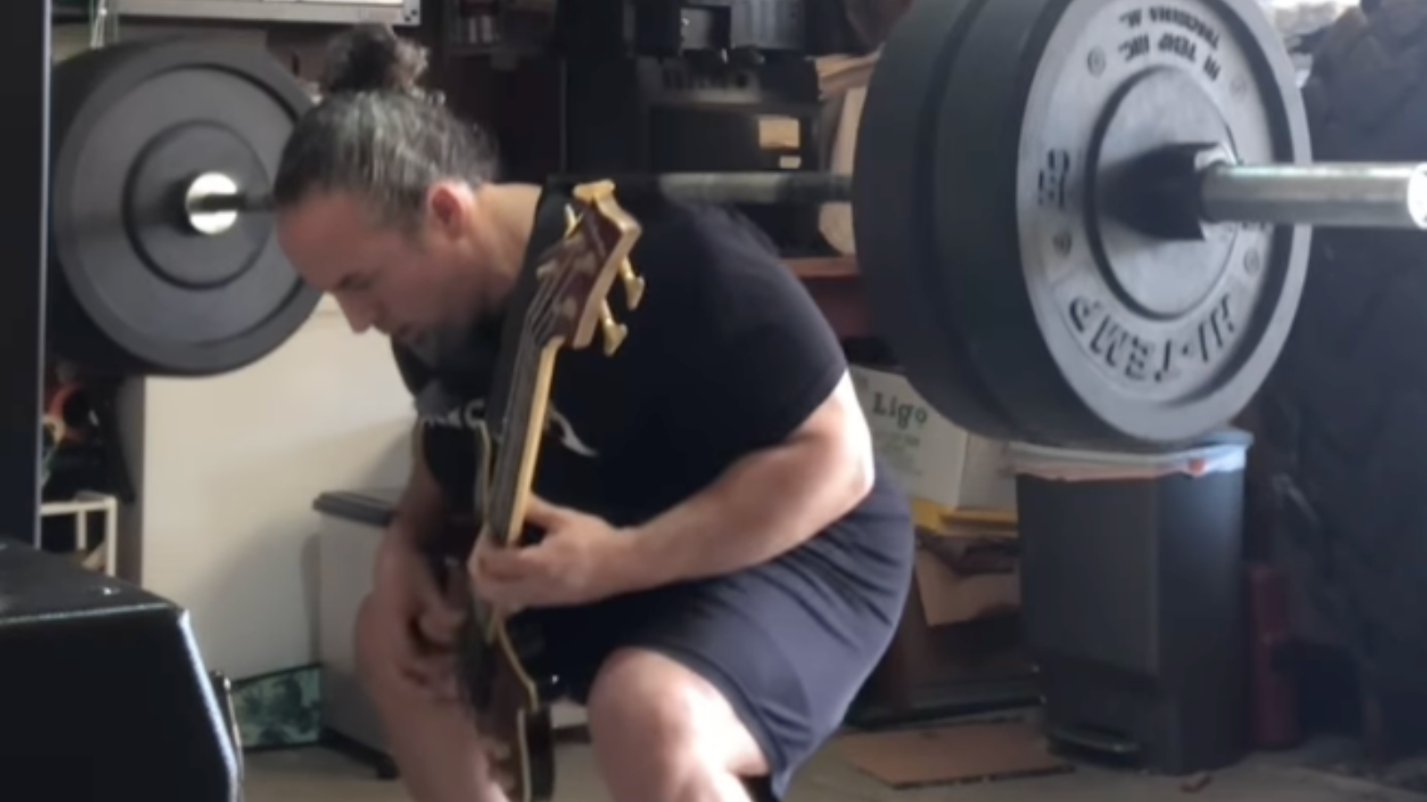 Watch man play Metallica’s Pulling Teeth bass solo while squatting 225lbs. Definitely DO NOT try this at home