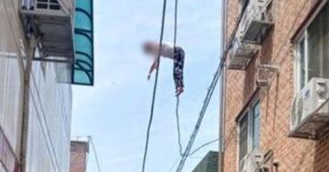 Woman Dangling From Power Lines Saved By Civilians And A Blanket