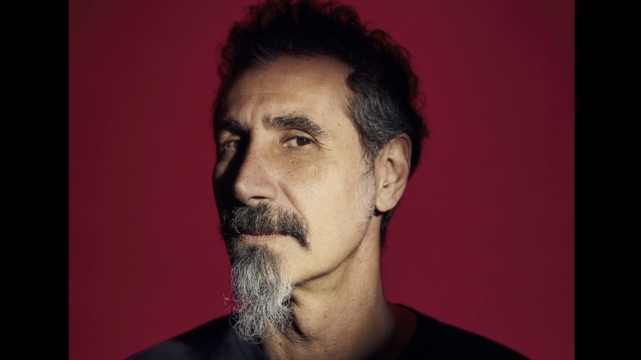 “Dystopian in mood, it’s a reflection of the angst and anti-authoritarian attitude I had to conformity.” Listen to Serj Tankian’s ‘new’ single A.F. Day, originally written for System Of A Down