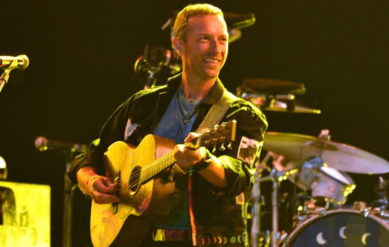 Glastonbury 2024: Coldplay bring out Michael J. Fox to play guitar and honour festival founder Michael Eavis