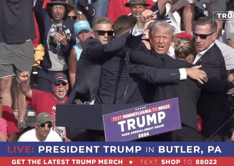 Donald Trump Rally Erupts In Gunfire As Secret Service Rush Stage, Xitter Thinks Shooting Was Staged