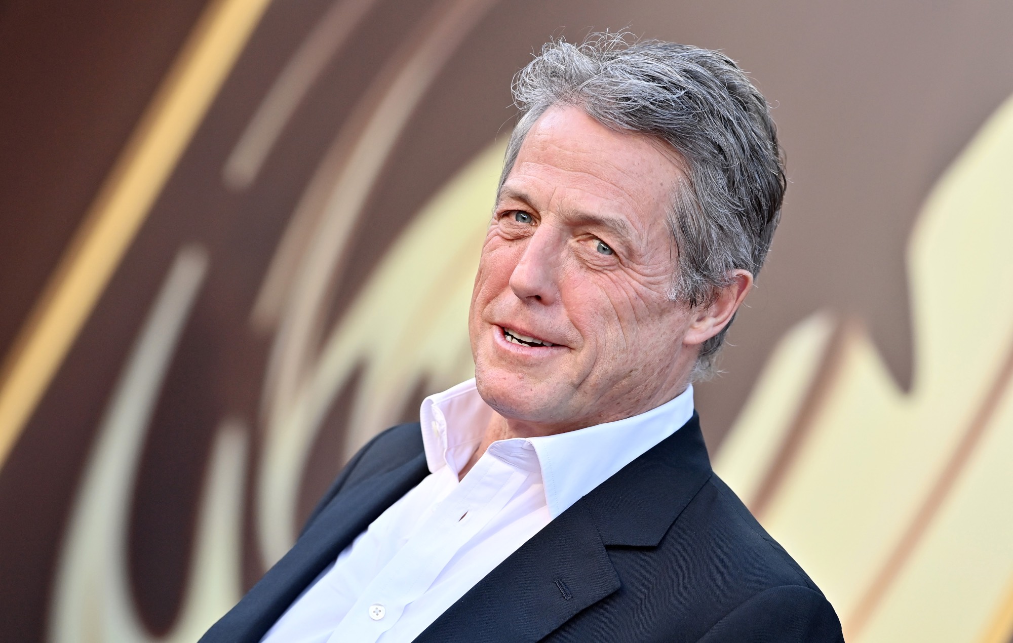 Hugh Grant laments “unbearable” closure of local cinema after 94 years