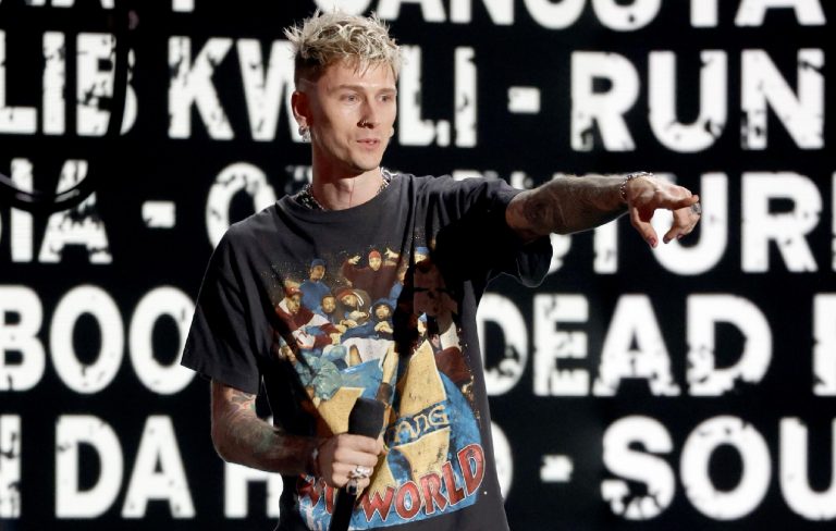 Machine Gun Kelly shows off new vampire fangs: “Might need ’em sharpened”