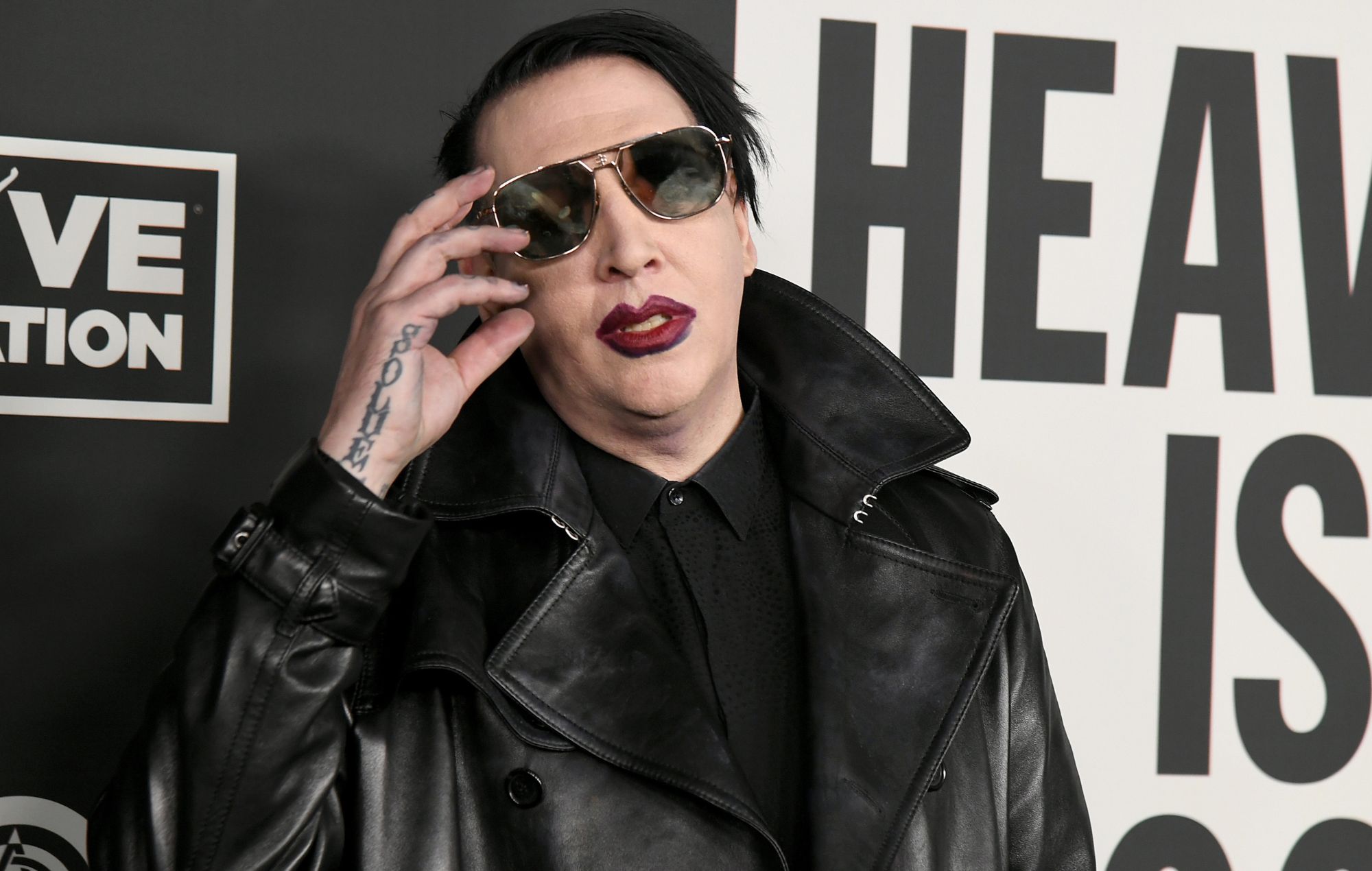 Woman who claims Marilyn Manson subjected her to “horrific” abuse, speaks publicly for first time