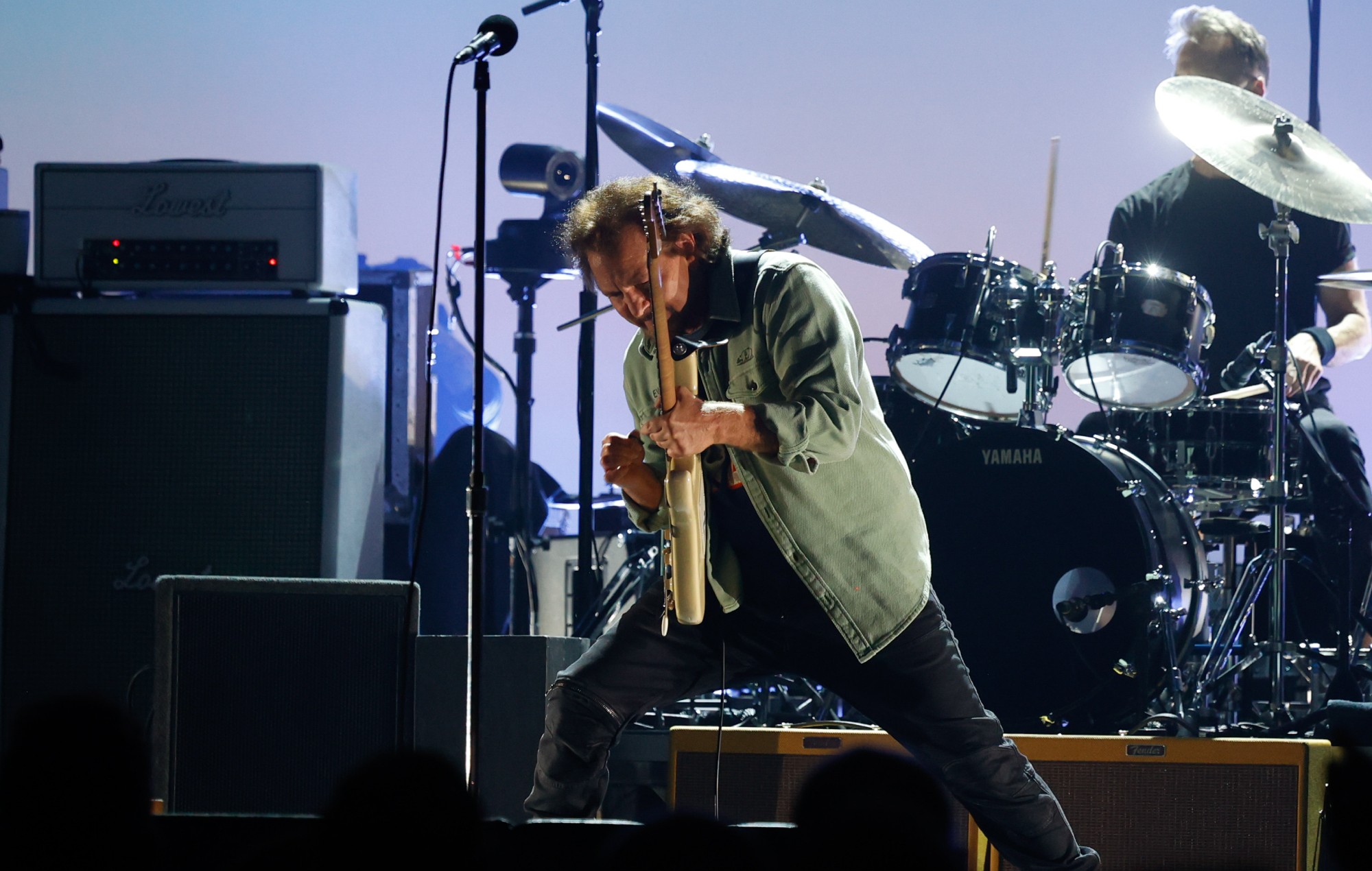 Watch Pearl Jam’s Eddie Vedder invite a fan onstage to perform ‘Yellow Ledbetter’ in Barcelona