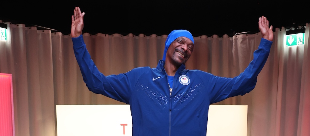 Snoop Dogg May Not Be Smoking In Paris, But He Is Bringing The Flame As An Official 2024 Olympic Torchbearer