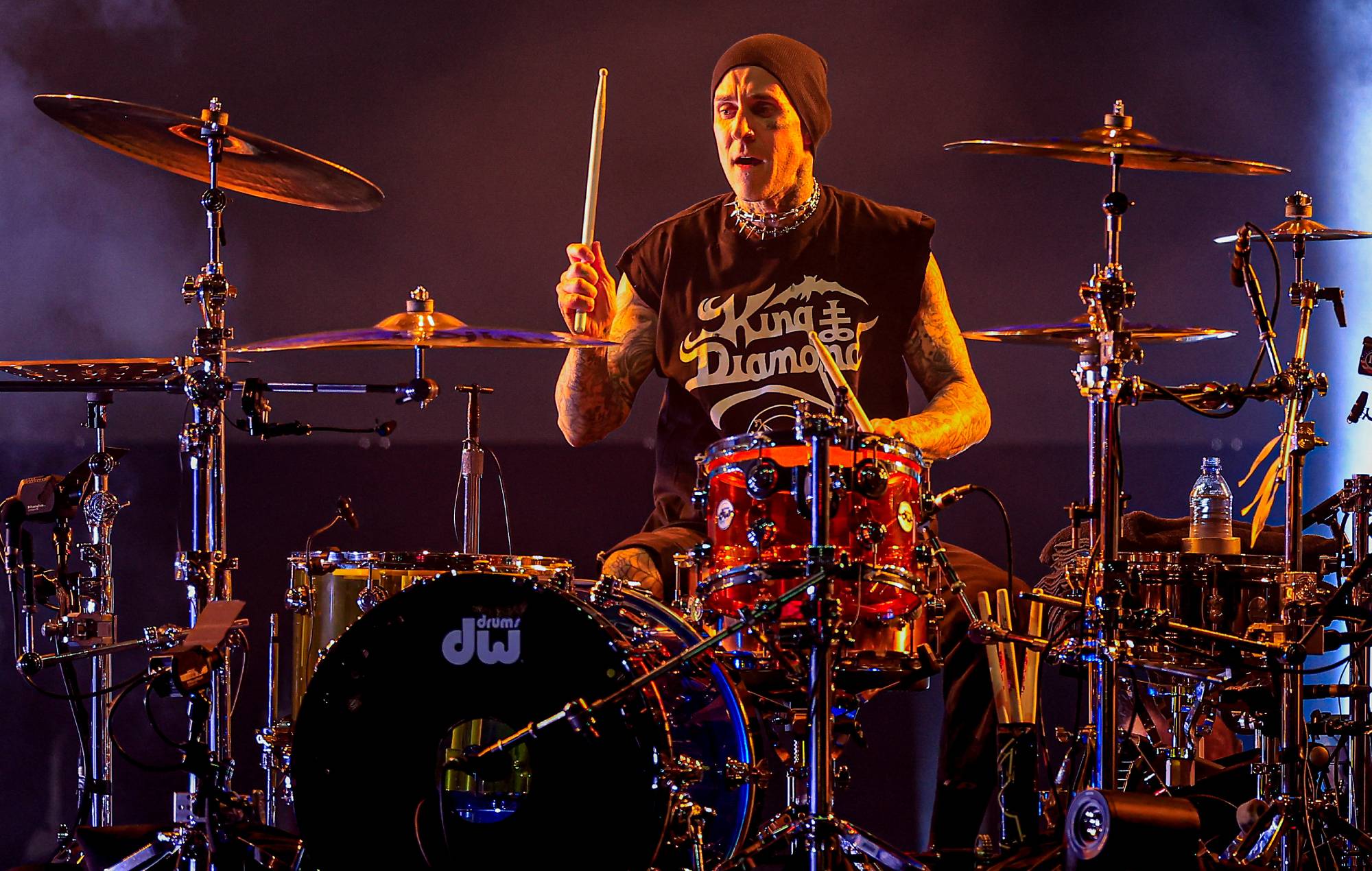 Blink-182’s Travis Barker auctions off boarding pass to mark conquering his fear of flying after accident