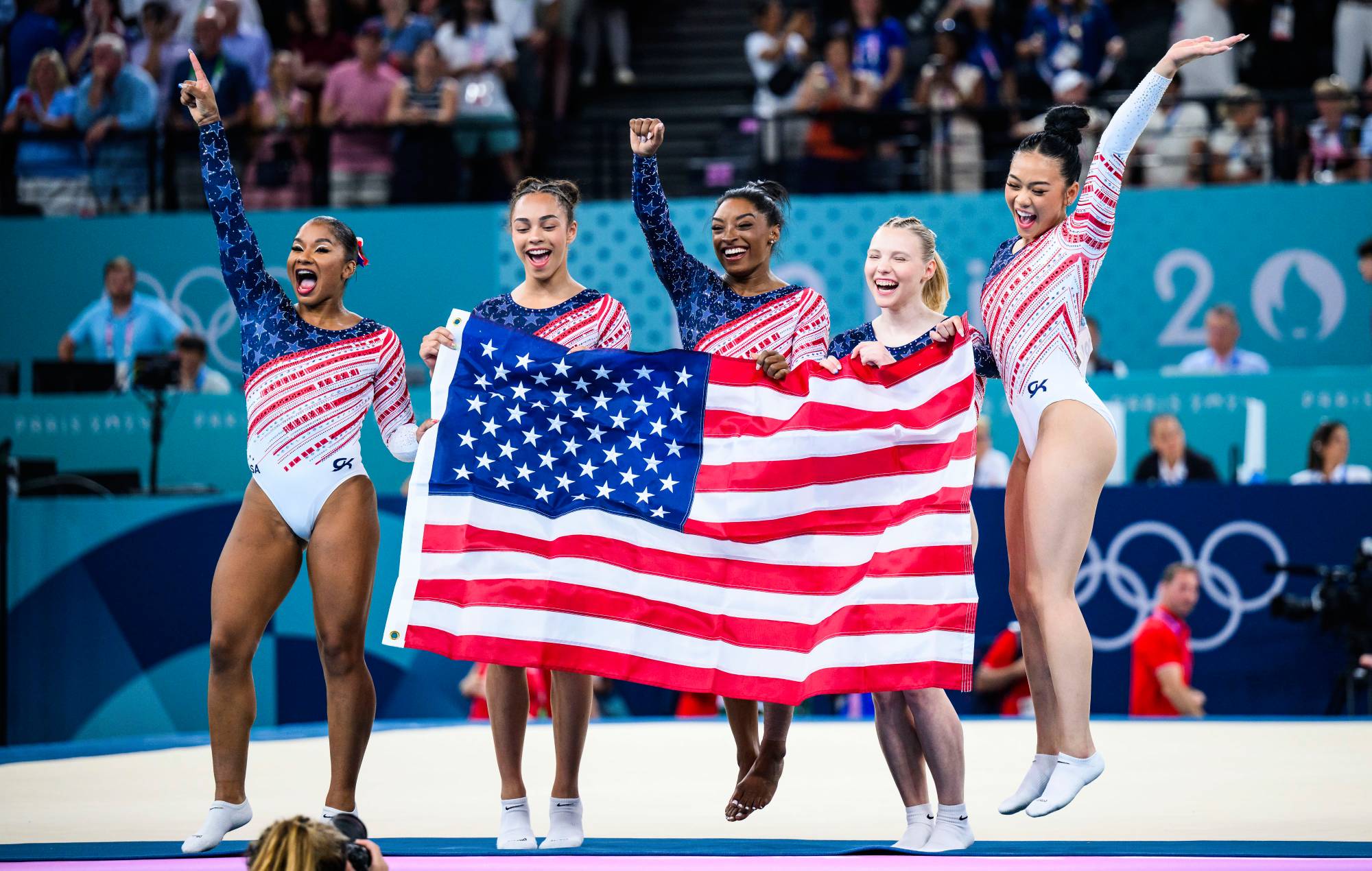 Watch Team USA gymnasts enact infamous Kanye West speech while picking up gold medal at Paris 2024 Olympics