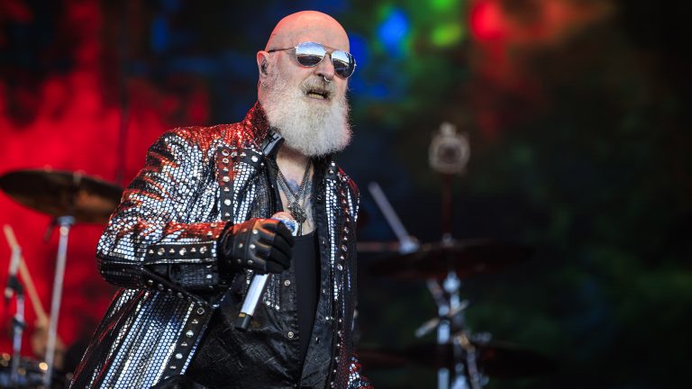 Judas Priest’s Rob Halford opens up about offering guidance to fellow LGBTQ+ musicians: “I’m here. I’m queer. Get f**king used to it.”