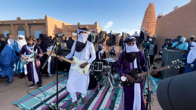 Camels, swords and dance: The film of Mdou Moctar’s concert at the edge of the Sahara desert is a thing of joy and magic