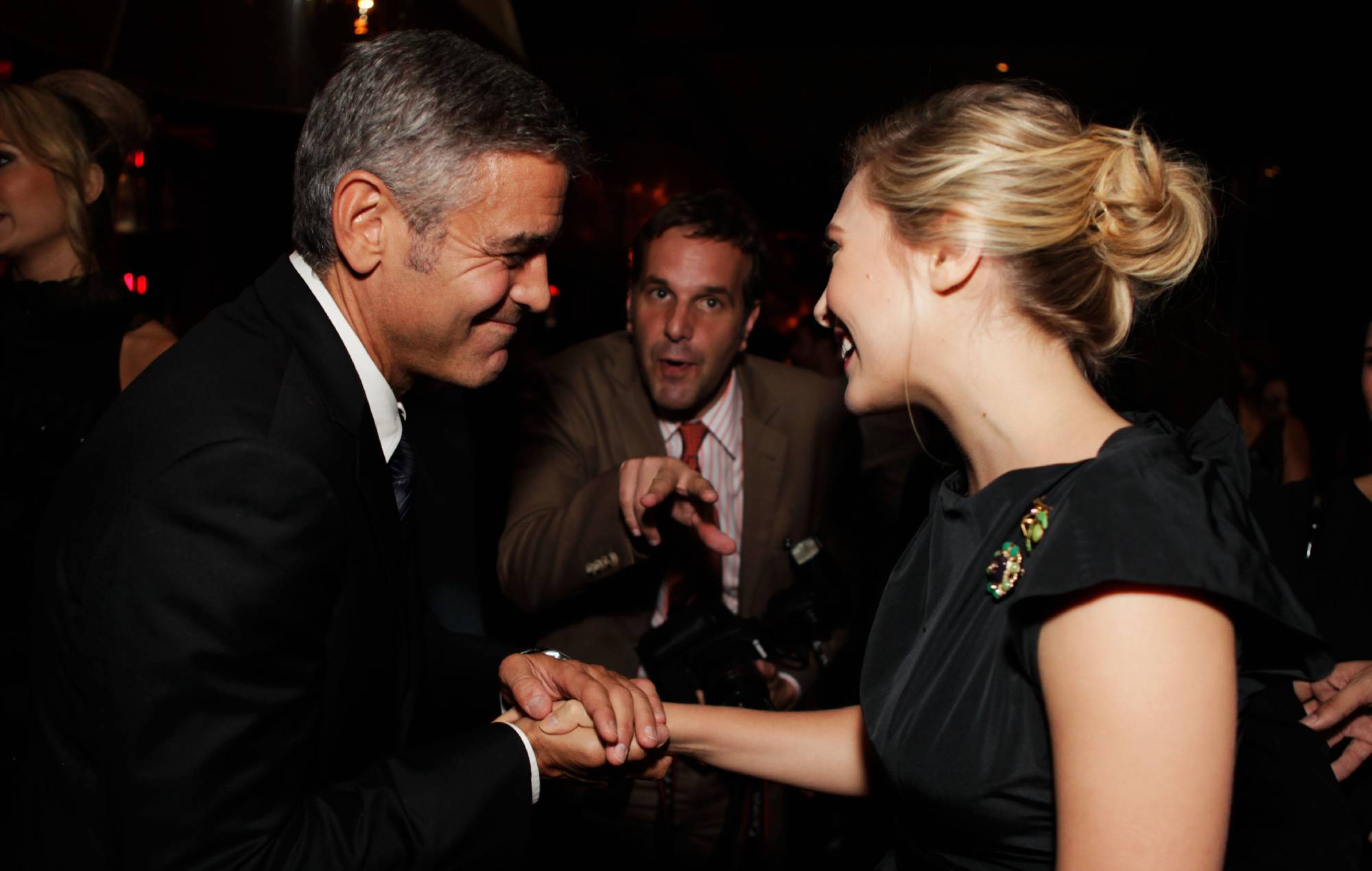 Elizabeth Olsen remembers being “starstruck” meeting George Clooney