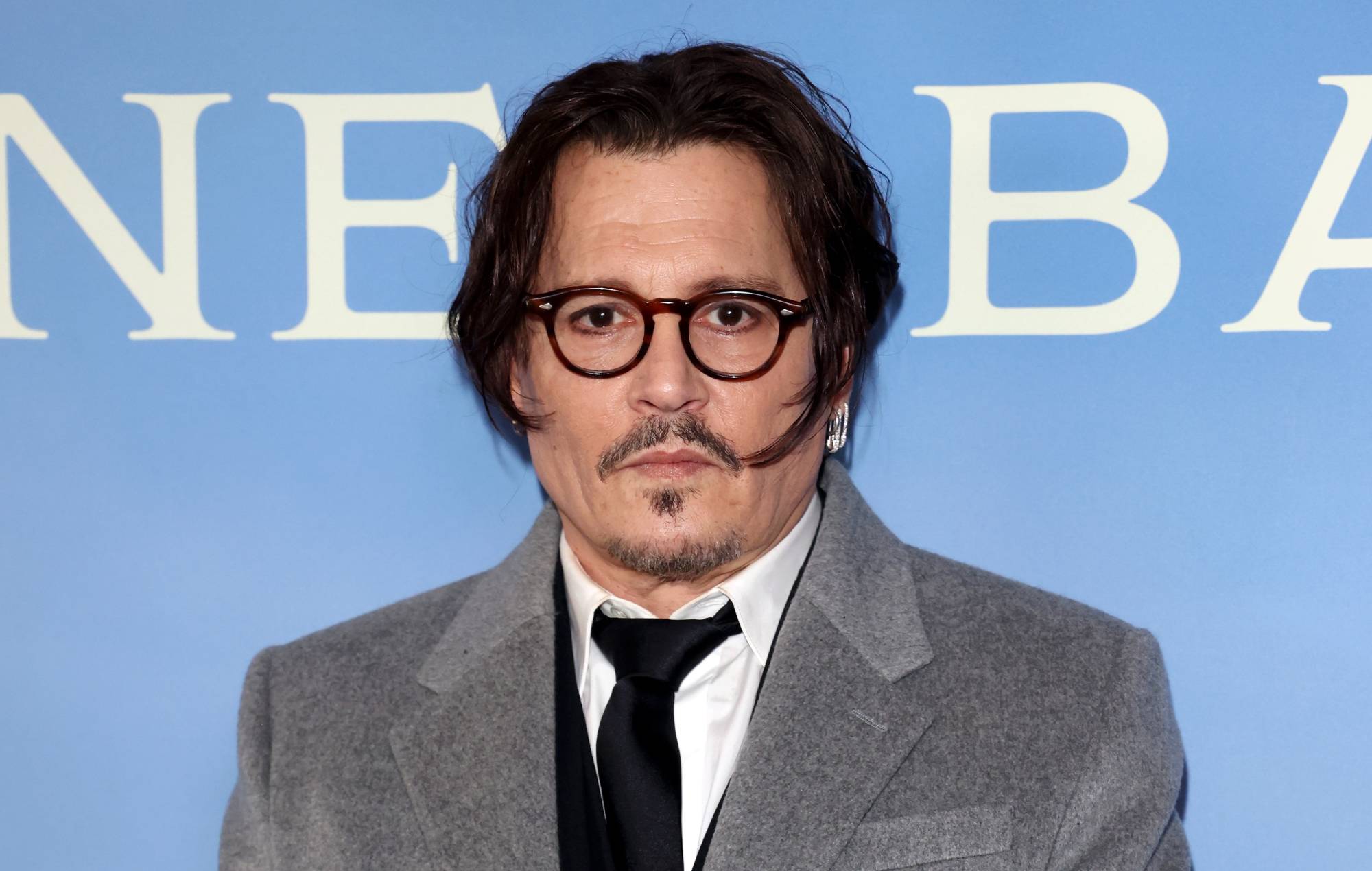 Johnny Depp fans have spotted he’s fixed his teeth