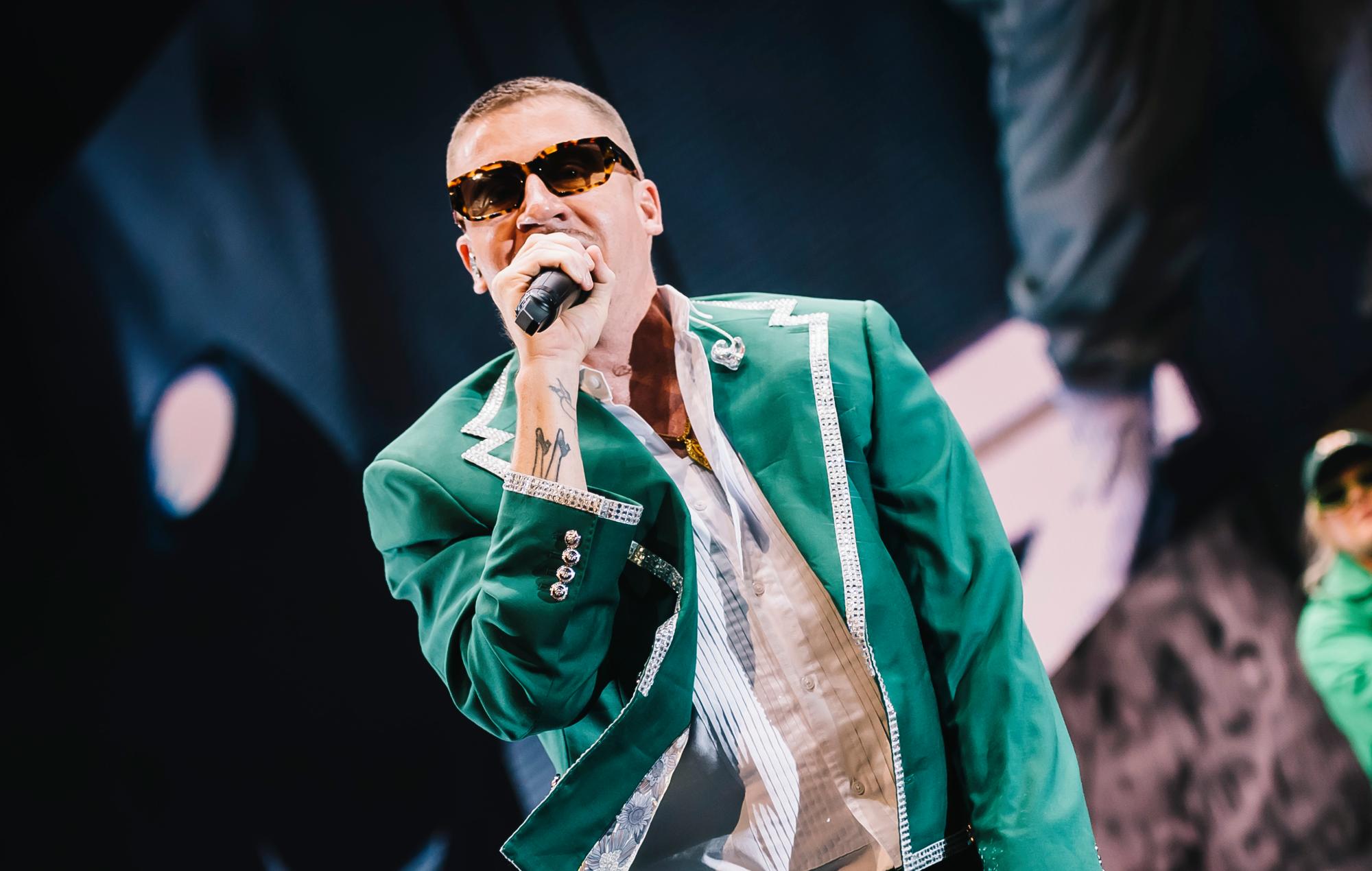 Macklemore dropped from music festival “due to unforeseen circumstances”