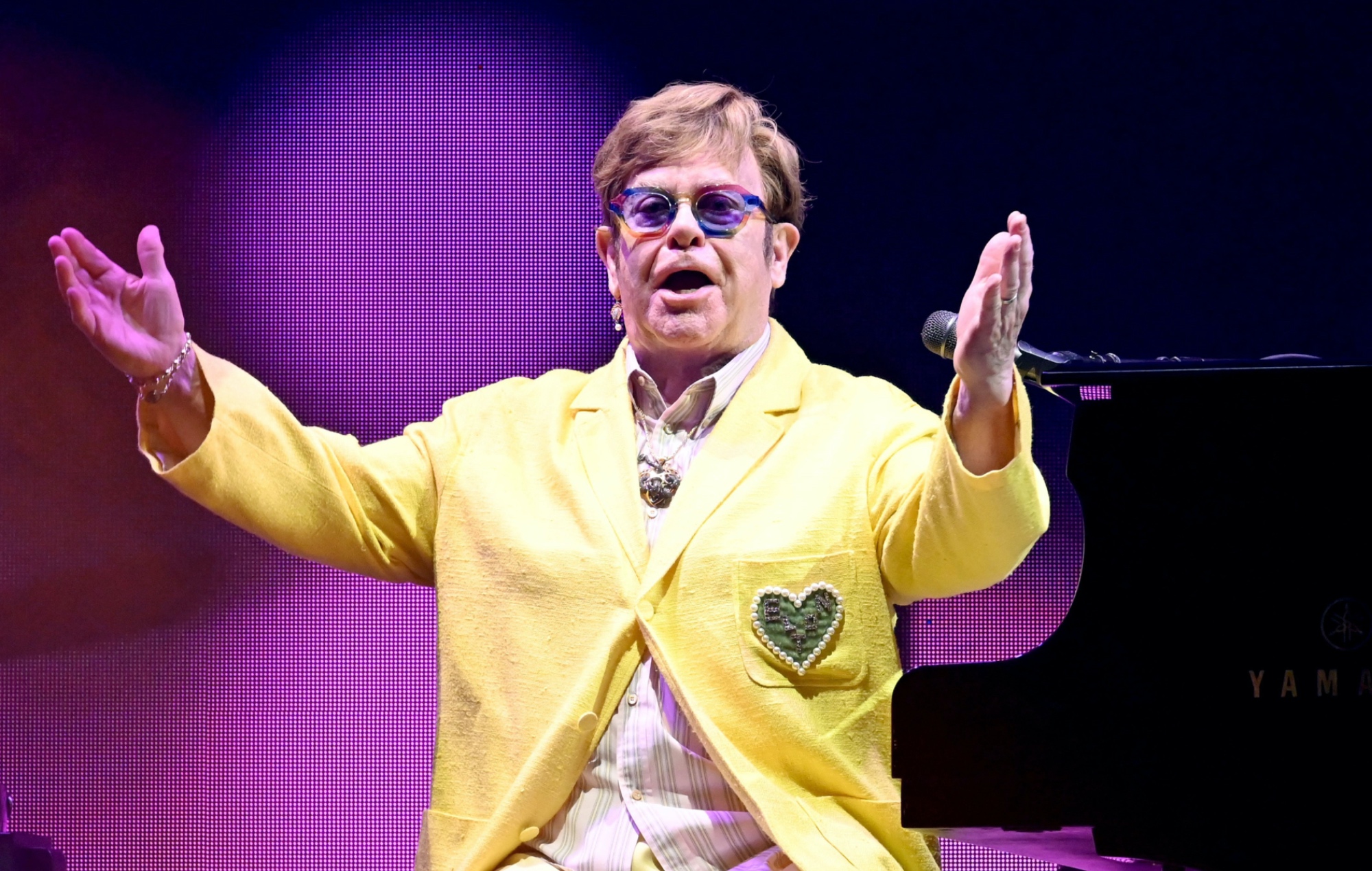 Elton John struggling to record new music due to eye condition: “I can’t see a lyric for a start”