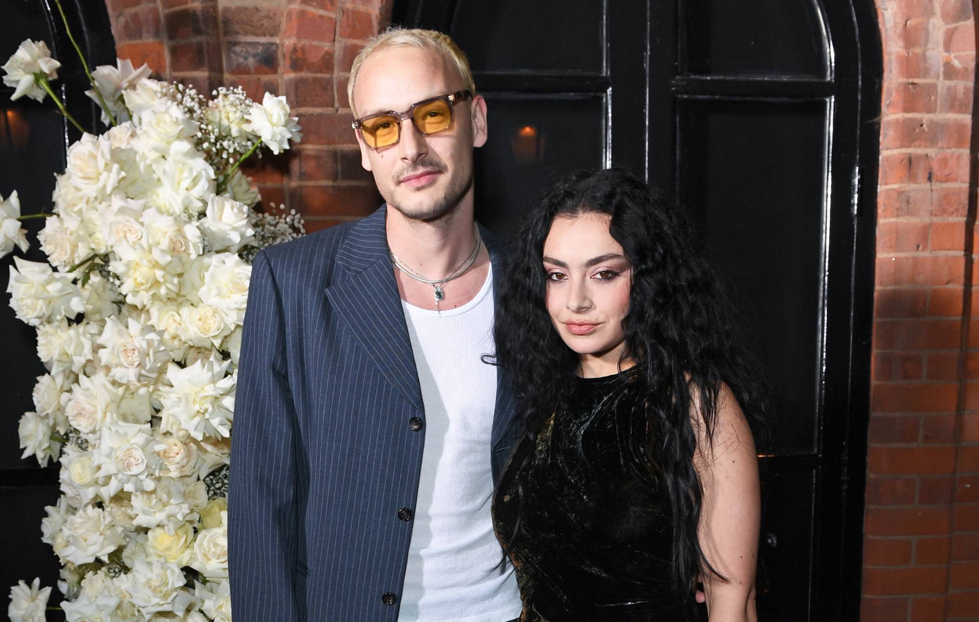 Watch The 1975’s George Daniel do viral ‘Apple’ dance at Charli XCX’s ‘Brat’ tour