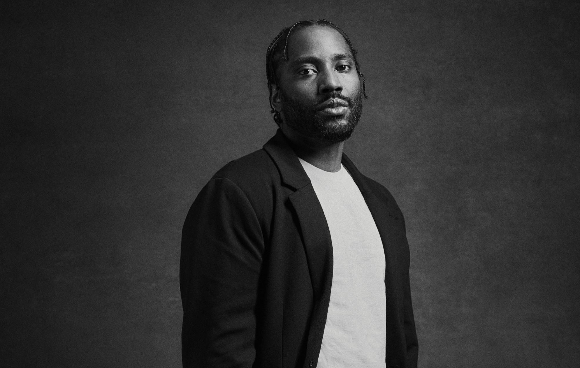 John David Washington is done hiding from his destiny: “I can see the artist I could become”