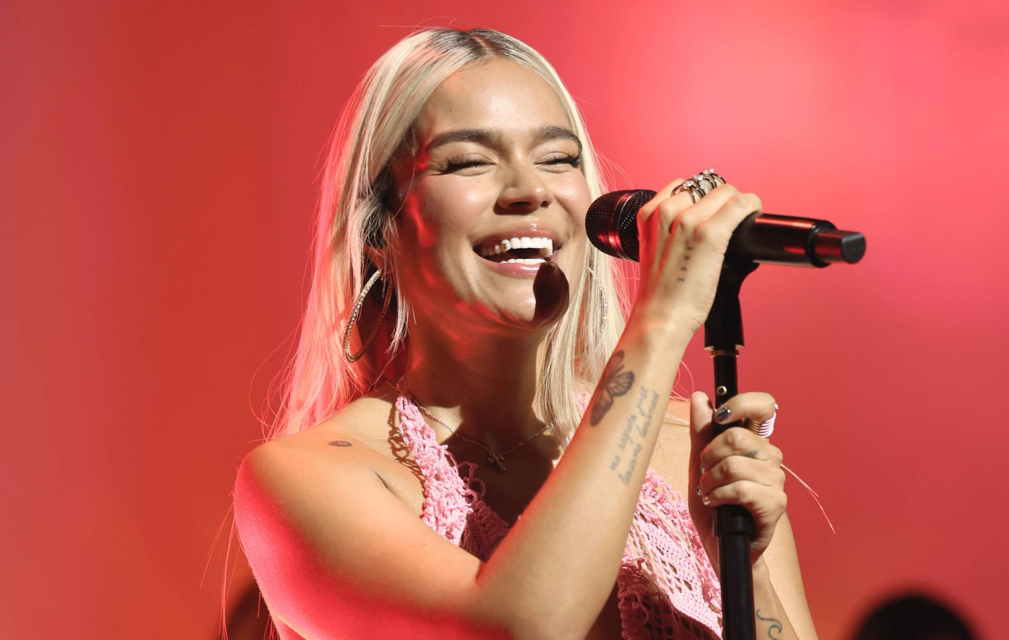 Karol G apologises after controversy over ‘+57’ lyrics