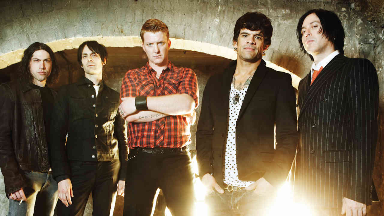 “I doubt our detractors would have the balls to do what we’ve done. You have to humble yourself at the altar of rock’n’roll”: How Queens Of The Stone Age’s Josh Homme rose above the chaos to make Lullabies To Paralyze