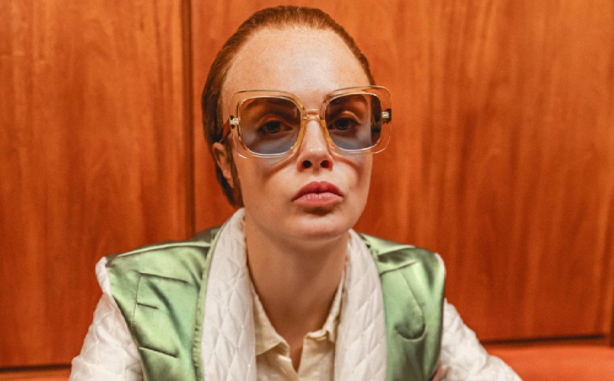 Watch Cara Delevingne become Elton John for new ‘Step Into Christmas’ video